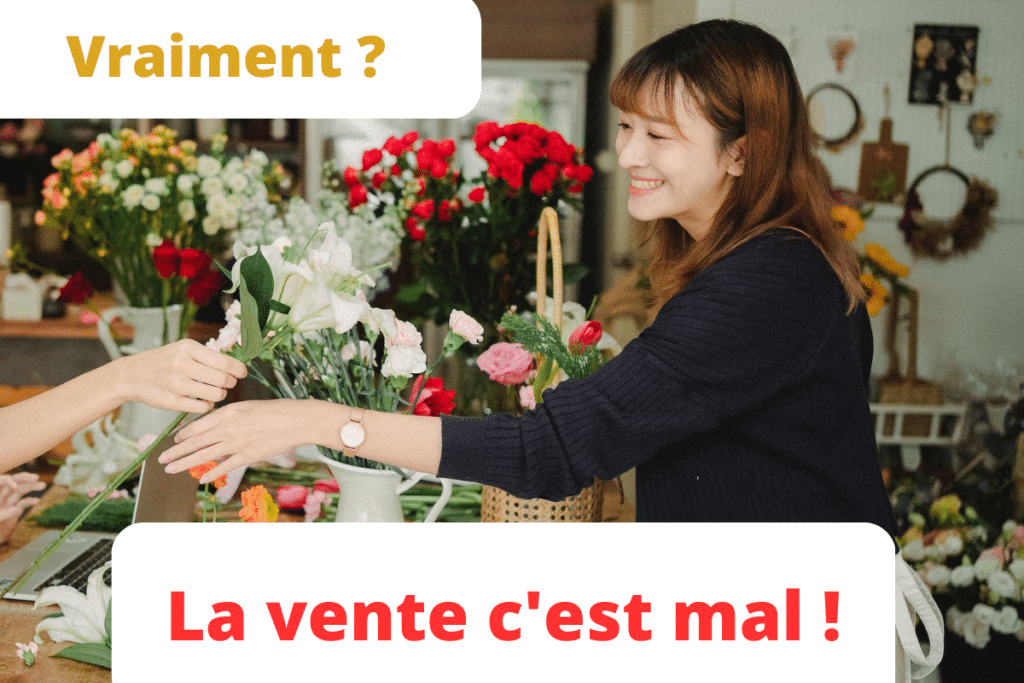 Une femme souriante vendant des fleurs : la vente c'est mal ! Vraiment ?